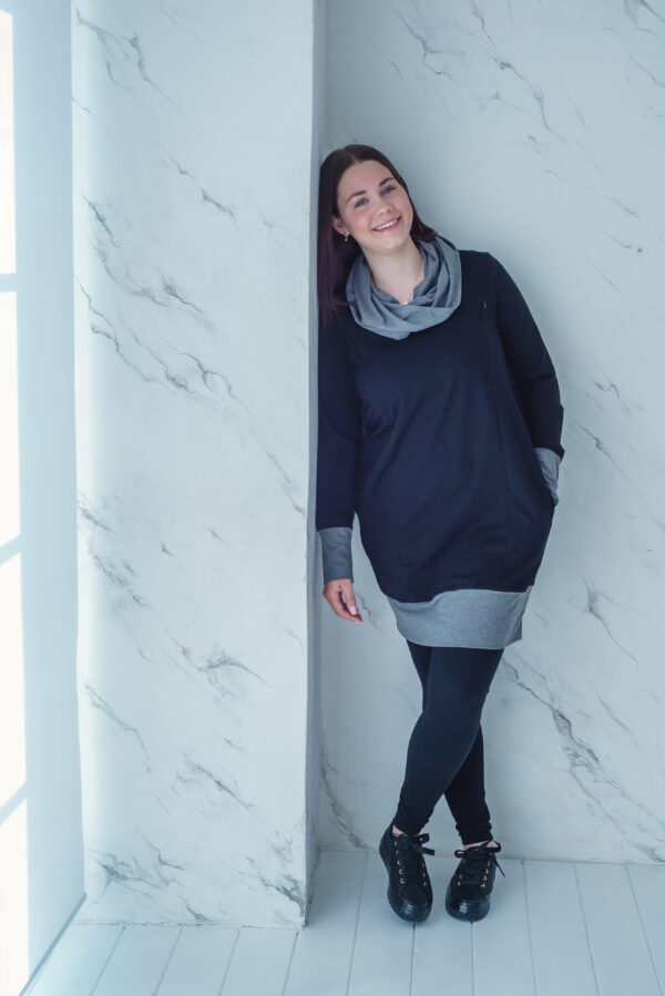 Woman wearing breastfeeding dress