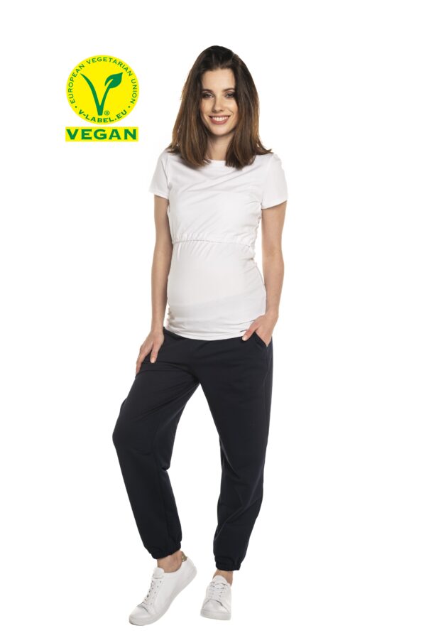 Woman wearing white vegan maternity blouse