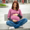 Pregnancy and breastfeeding blouse in pink.