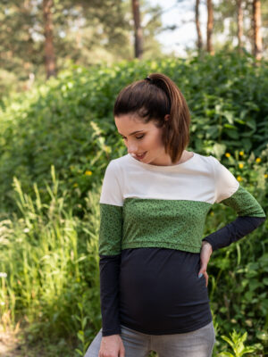 Woman in green layered nursing blouse.