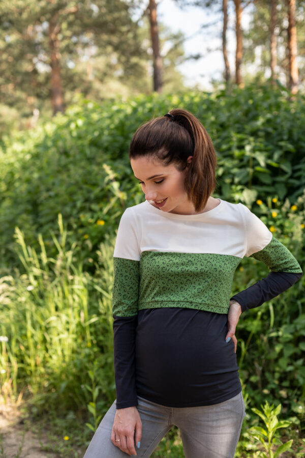 Woman in green layered nursing blouse.